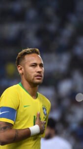 Neymar Gelled Curly Style with Blonde Streaks